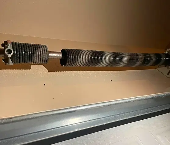 BROKEN GARAGE DOOR SPRING IN DALLAS - Infinity Garage Door Repair Dallas