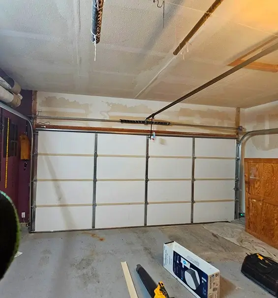 YOUR GARAGE DOOR OFF ITS TRACKS - Infinity Garage Door Repair Dallas